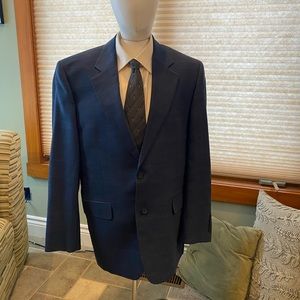 This is a beautiful designer sport coat for men. You can dress it up or down.